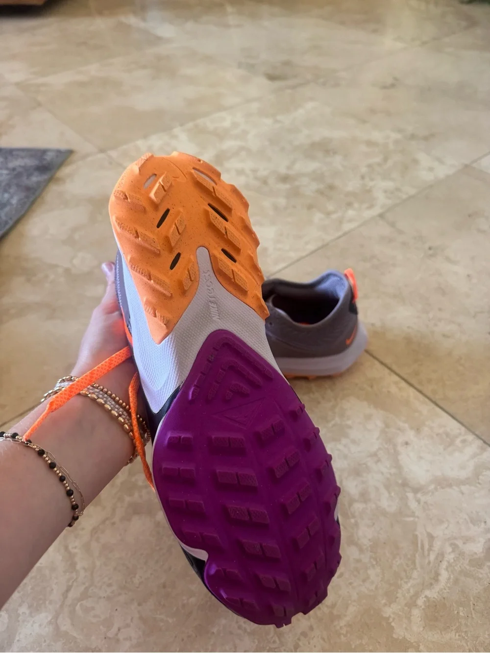 Nike Trail Running Sneakers in Purple with Bright Orange Accents